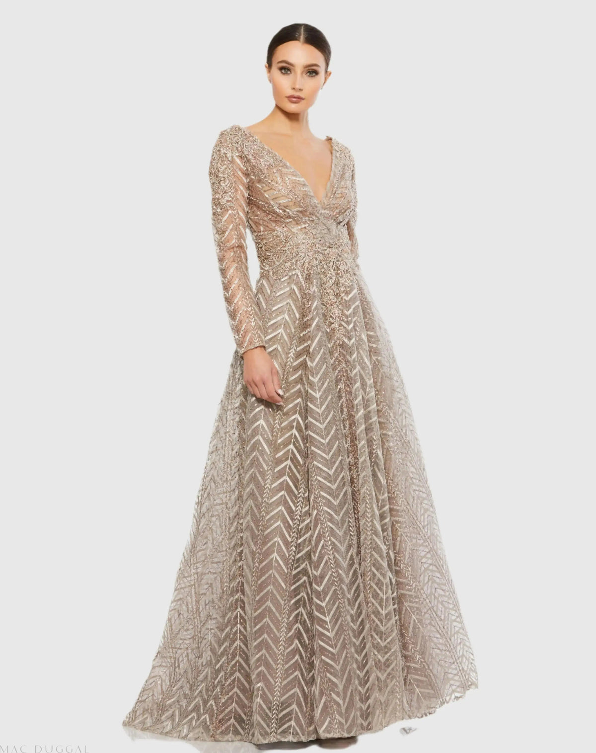 Embellished Illusion Long Sleeve Wrap Over A Line Gown