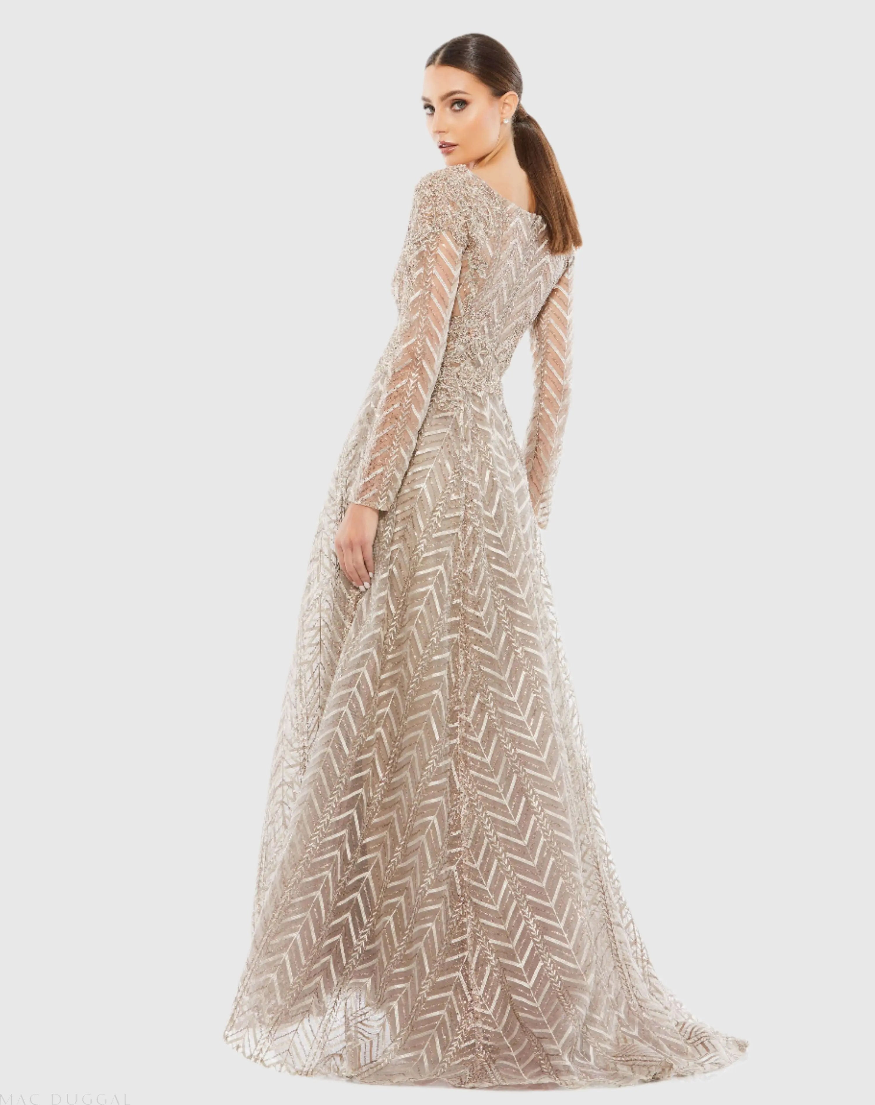 Beige Embellished Illusion Long Sleeve Wrap Over A Line Gown